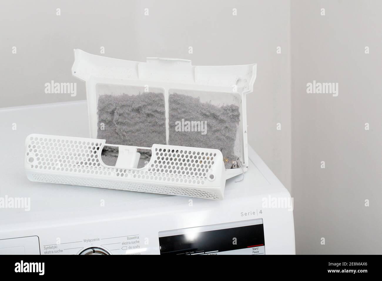 Dirty filter from clothes dryer Stock Photo Alamy