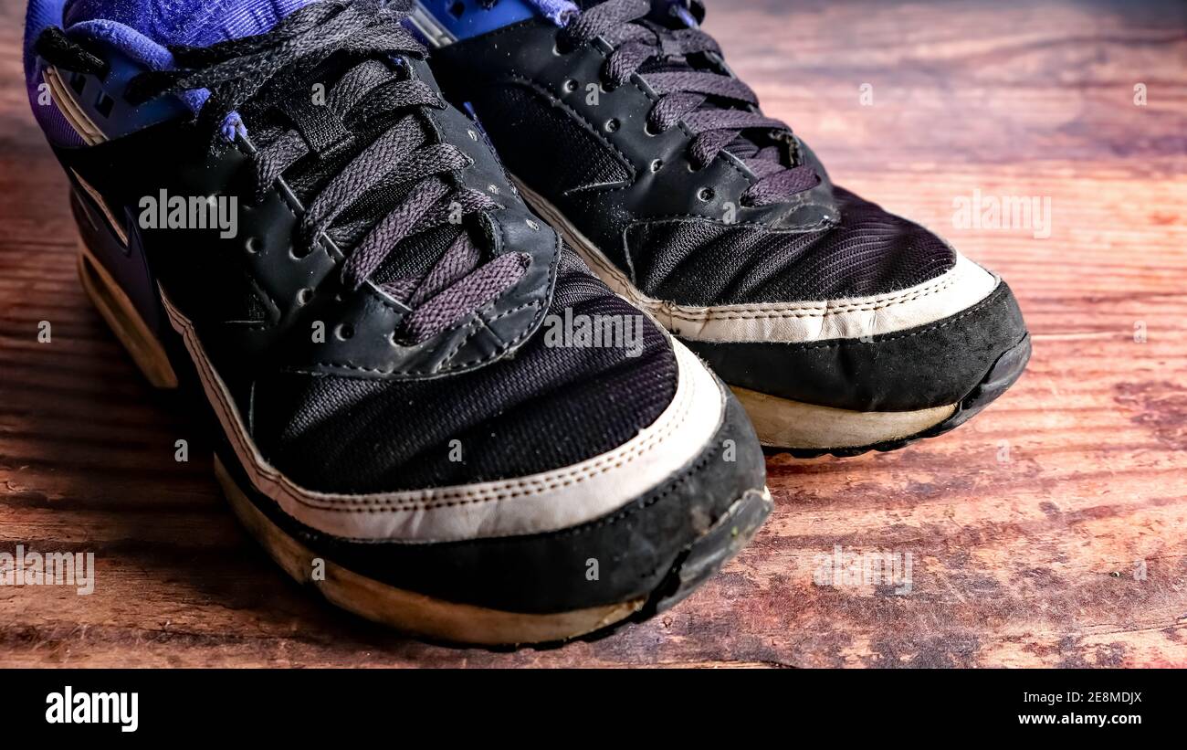 black and purple trainers