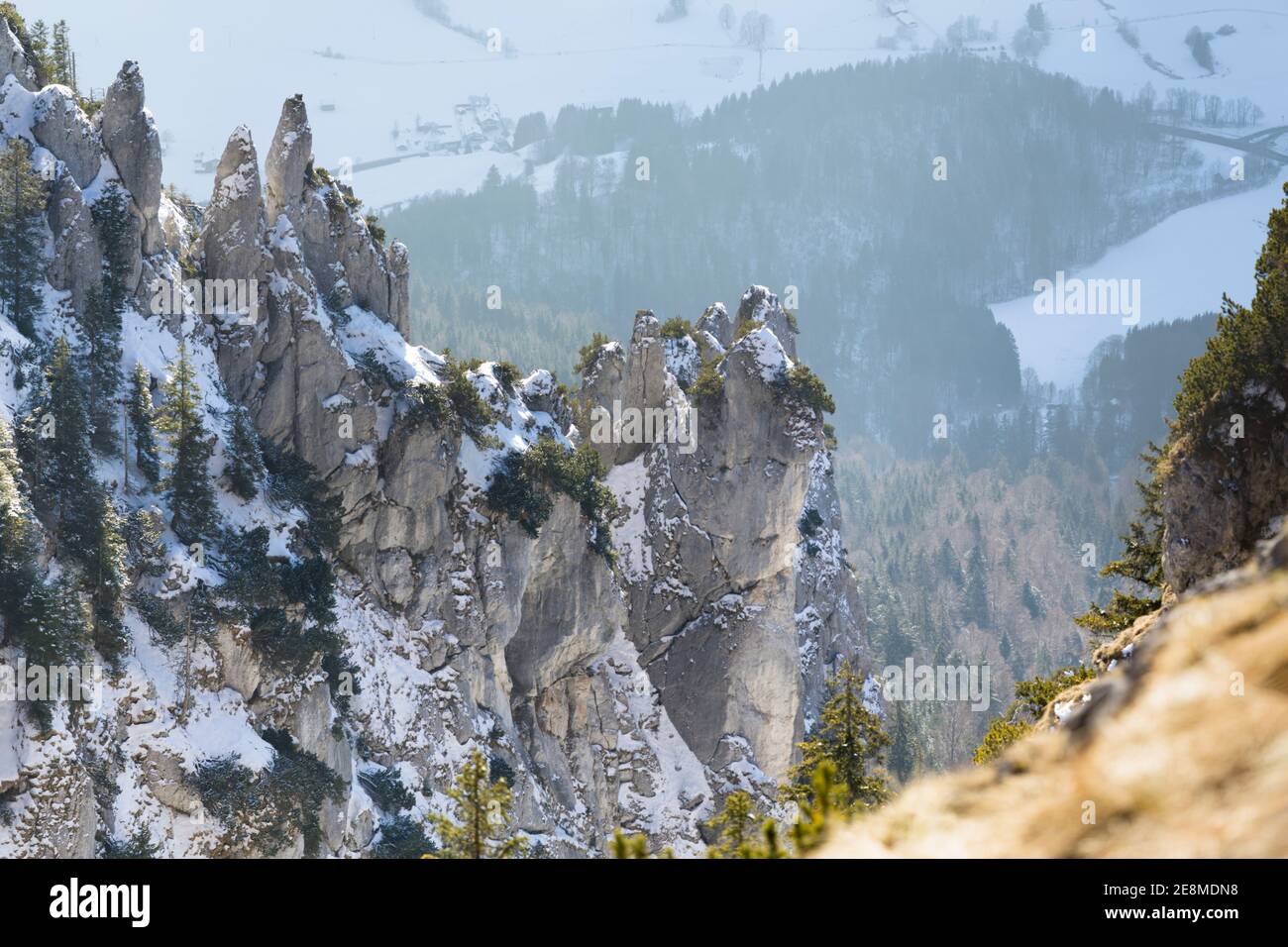 Beautifully sun lit mountains covered in snow Stock Photo