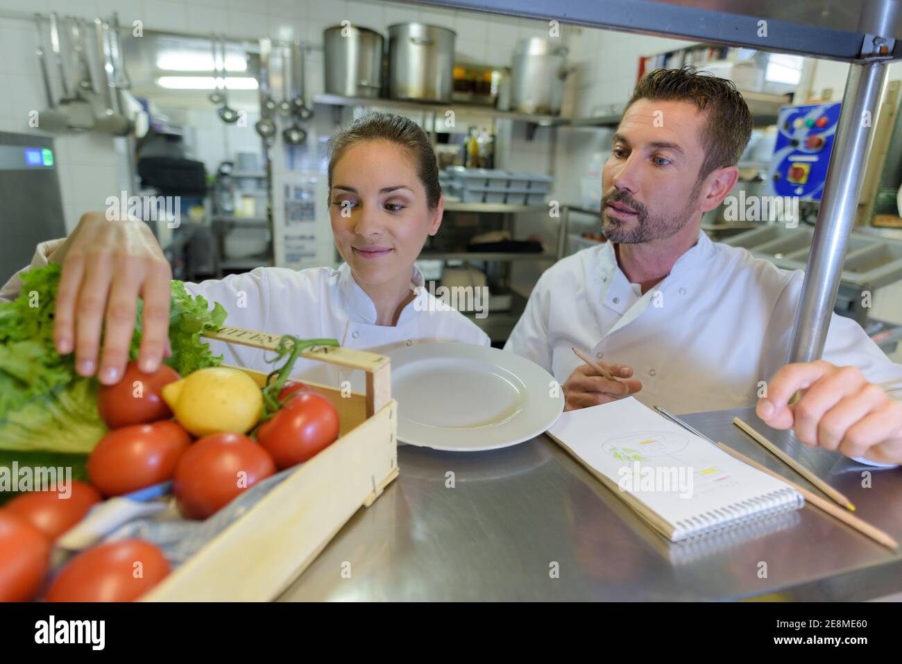 Two cooks hi-res stock photography and images - Alamy
