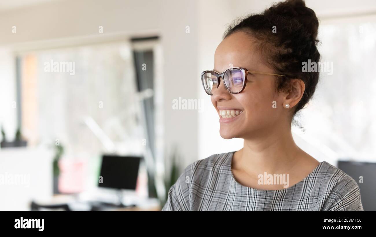 Happy African American business woman wearing trendy glasses Stock Photo