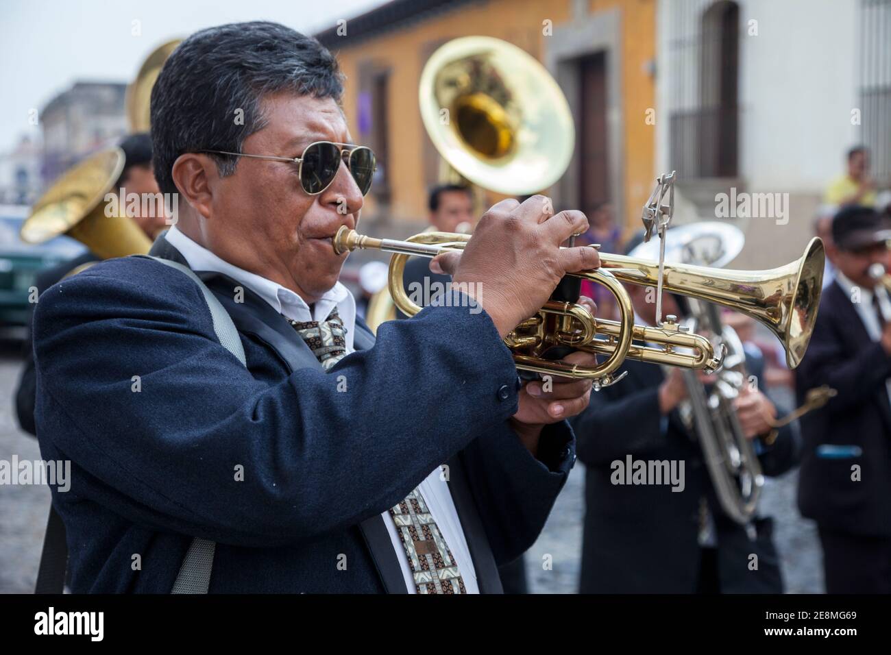 Antigua, Guatemala.  Trumpet Player in a marching band, Semana Santa. Stock Photo