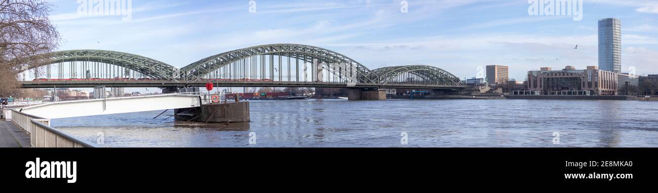 cologne, NRW, Germany, 01 31 2021, panorama of Hohenzollernbridge over Rhine river and Hyatt Hotel Stock Photo