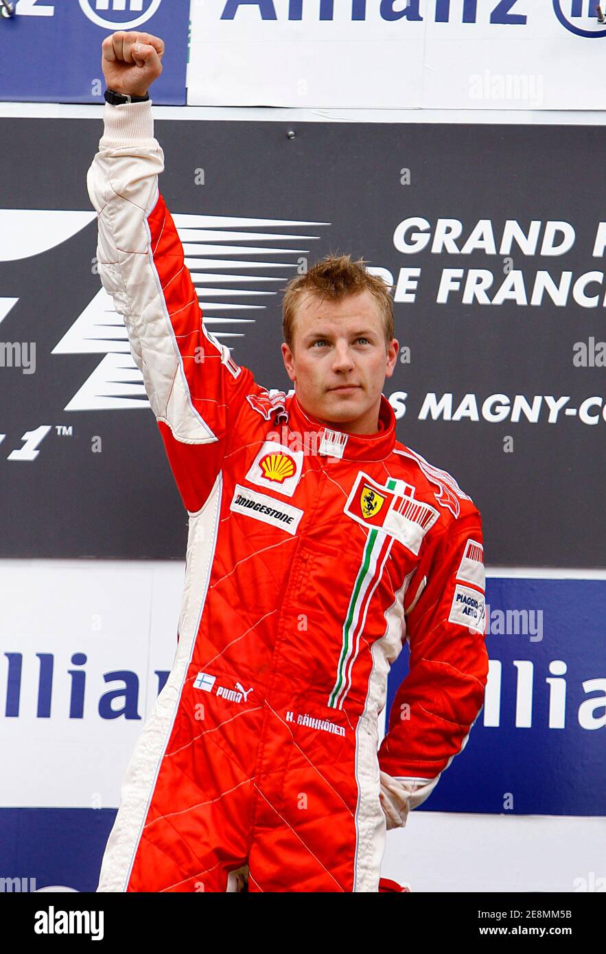 Finnish Formula One driver Kimi Raikkonen of Ferrari celebrates on the  podium after winning the French Grand Prix at the Magny-Cours race track  near Nevers in France July 1, 2007. Photo by