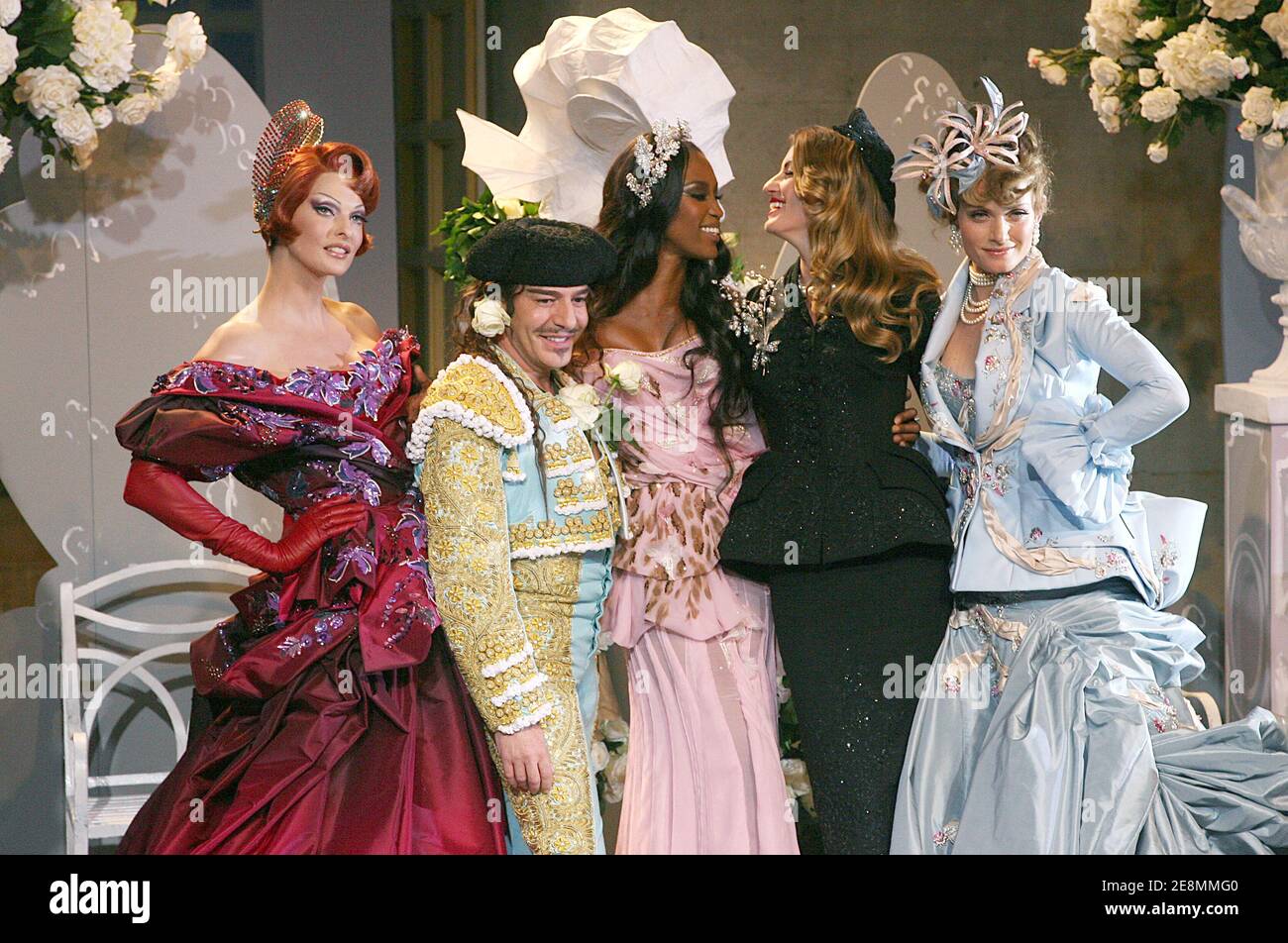 British designer John Galliano poses with Linda Evangelista (2ndL), Naomi Campbell (3rdL), Gisele Bundchen (2nd R) and Helena Christensen (1st R) at the end of for Christian Dior Fall-Winter 2007-2008 Haute-Couture collection show, in Versailles, France on July 2, 2007. The prestigious fashion house of Christian Dior is celebrating its 60th birthday this week and John Galliano his 10th year as Dior's designer. Photo by Nebinger-Orban-Taamallah/ABACAPRESS.COM Stock Photo
