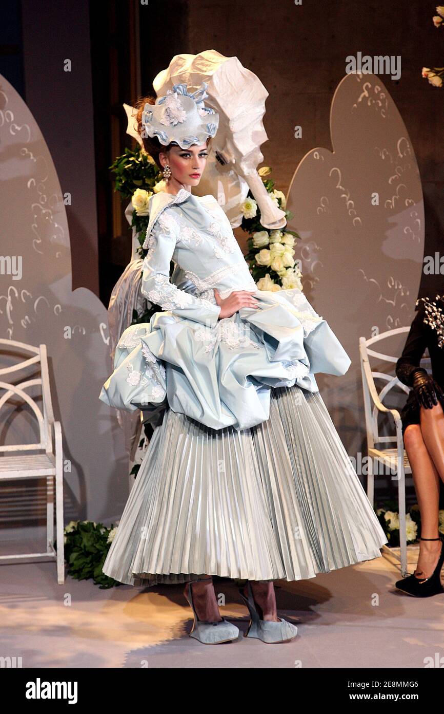 A model presents a creation by British designer John Galliano for