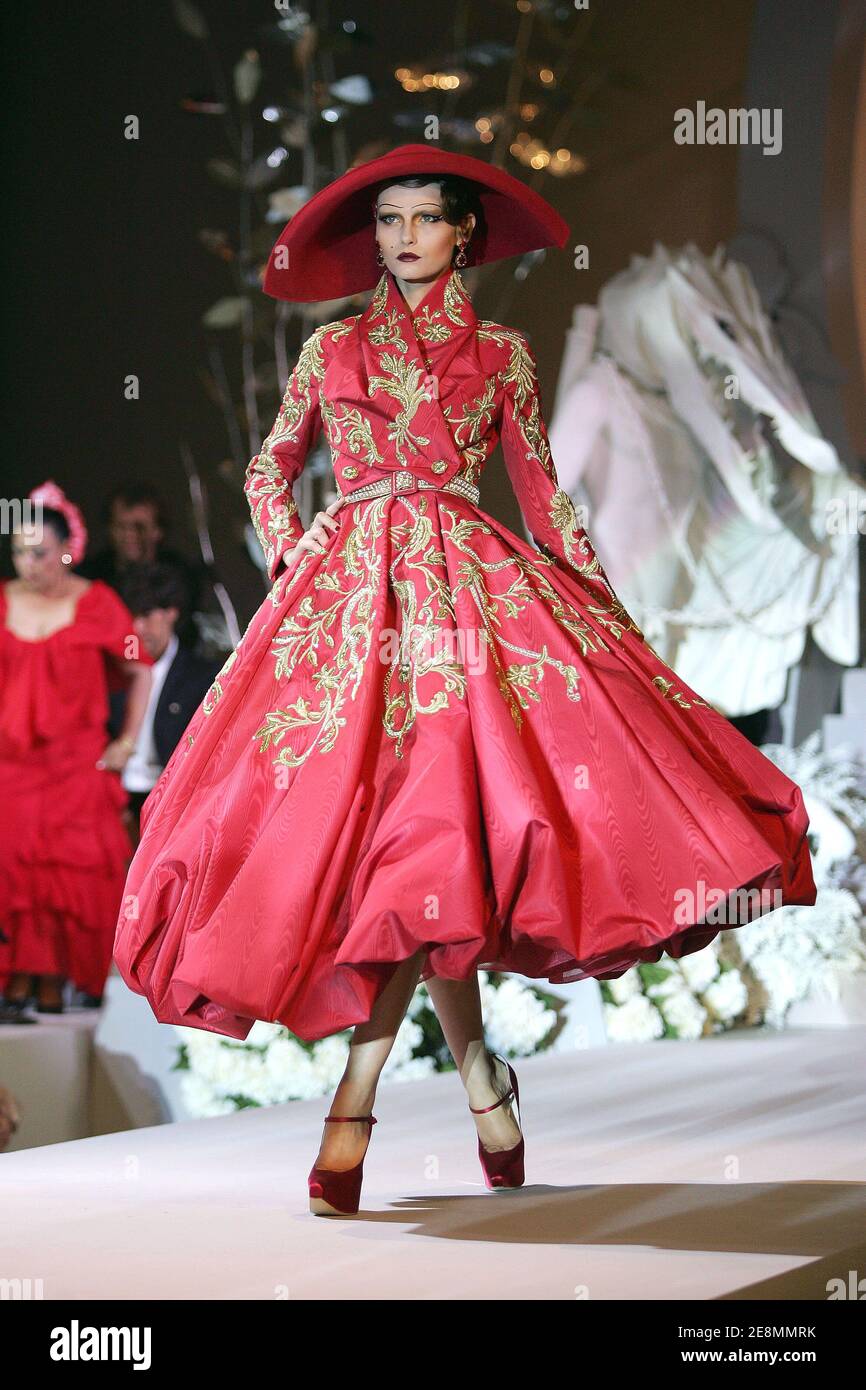 A model presents a creation by British designer John Galliano for