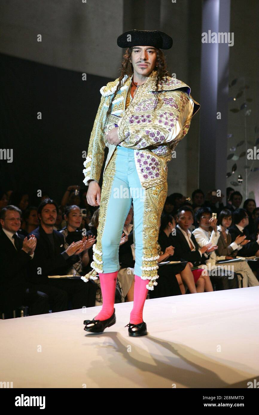 British designer John Galliano runs the catwalk during Dior's