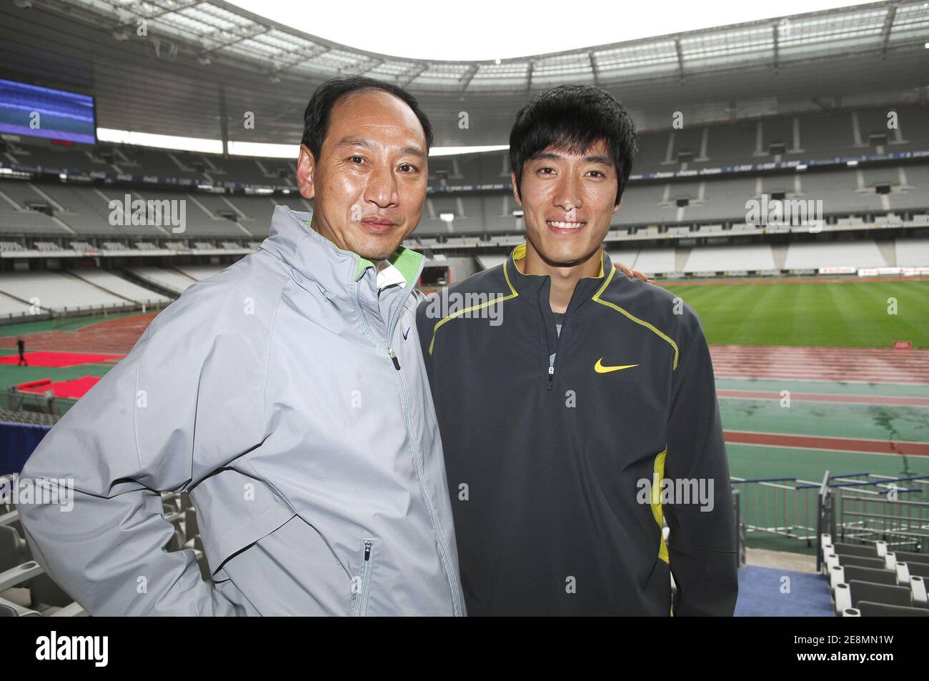 China's Liu Xiang and his coach Sun Haiping during the press conference to present the IAAF Golden League athletics meeting, in Saint-Denis, france, on July 3, 2007. Photo by Christophe Guibbaud-Gouhier/Cameleon/ABACAPRESS.COM Stock Photo