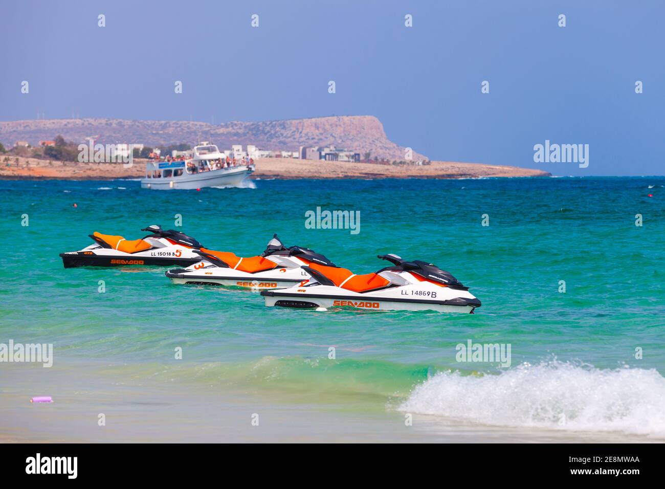 Ayia Napa, Cyprus - June 12, 2018: Few jet skis for rent are on the beach of Agia Napa Stock Photo