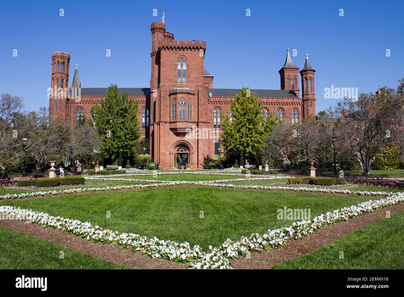 view of red brick castle like headquarters of the Smithsonian Institute on national mall Stock Photo