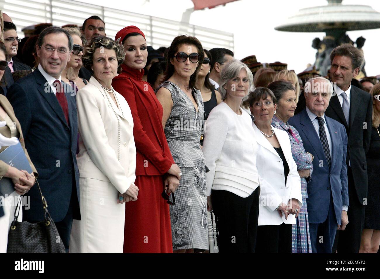 (L to R) French secretary general of the Elysee Palace Claude Gueant and his wife, Sheikha Moza bint Nasser al-Misn, Qatar's emir Sheikh Hamad bin Khalifa's wife, First Lady Cecilia Sarkozy, Former Health minister Simone Veil and her husband Antoine attend the parade down the Champs Elysees on Bastille Day in Paris, France on July 14, 2007. Nicolas Sarkozy presides for the first time over Bastille Day national holiday celebrations. Photo by Gilles Bassignac/Pool/ABACAPRESS.COM Stock Photo