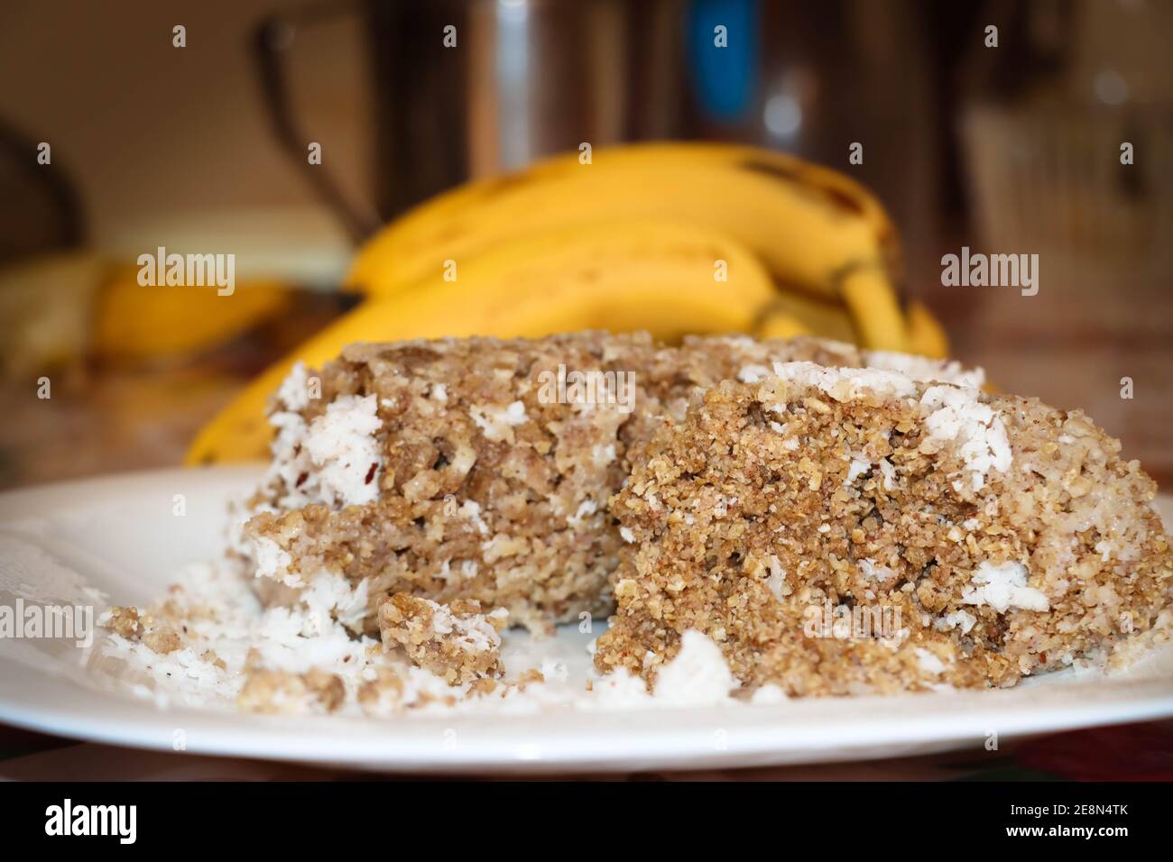 CLoseup Image Of Wheat Puttu With Bananas. Selective Focus Stock Photo