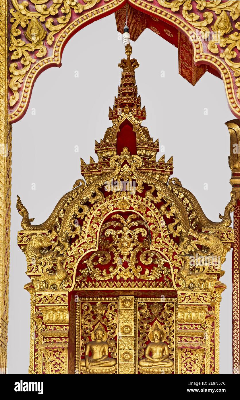 Entrance Portal With Gilded Carvings Illustrating Mythological Mythical Creatures And Scenes From The Life Of Buddha, Temple Wat Nong Sikhounmuang, Lu Stock Photo