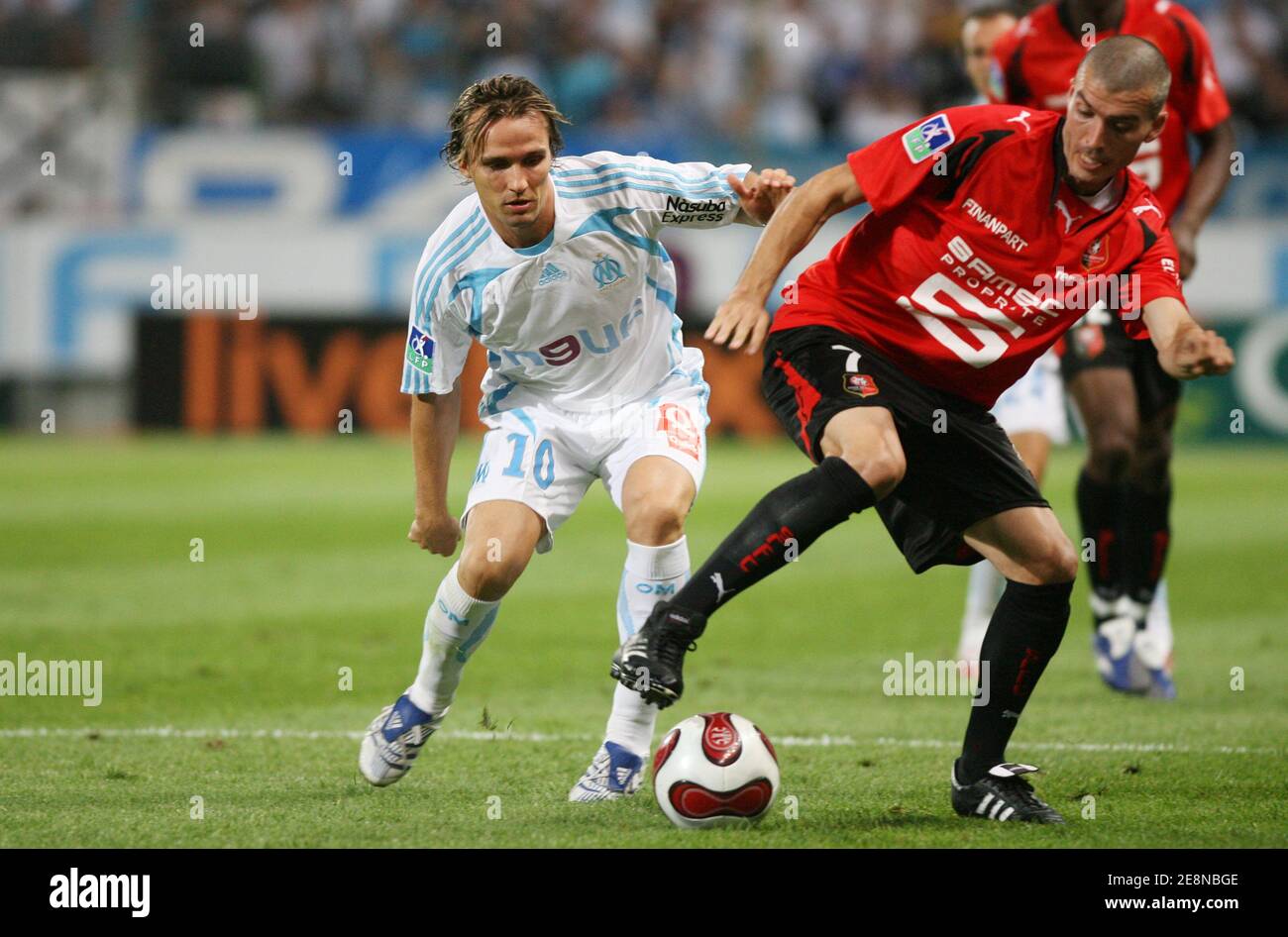 OM's Boudewijn Zenden and Rennes's Jerome Leroy battle for the ball during  the French Premier League football match, OM vs Rennes at 'Le Velodrome' in  Marseille, France. On August 11, 2007. The