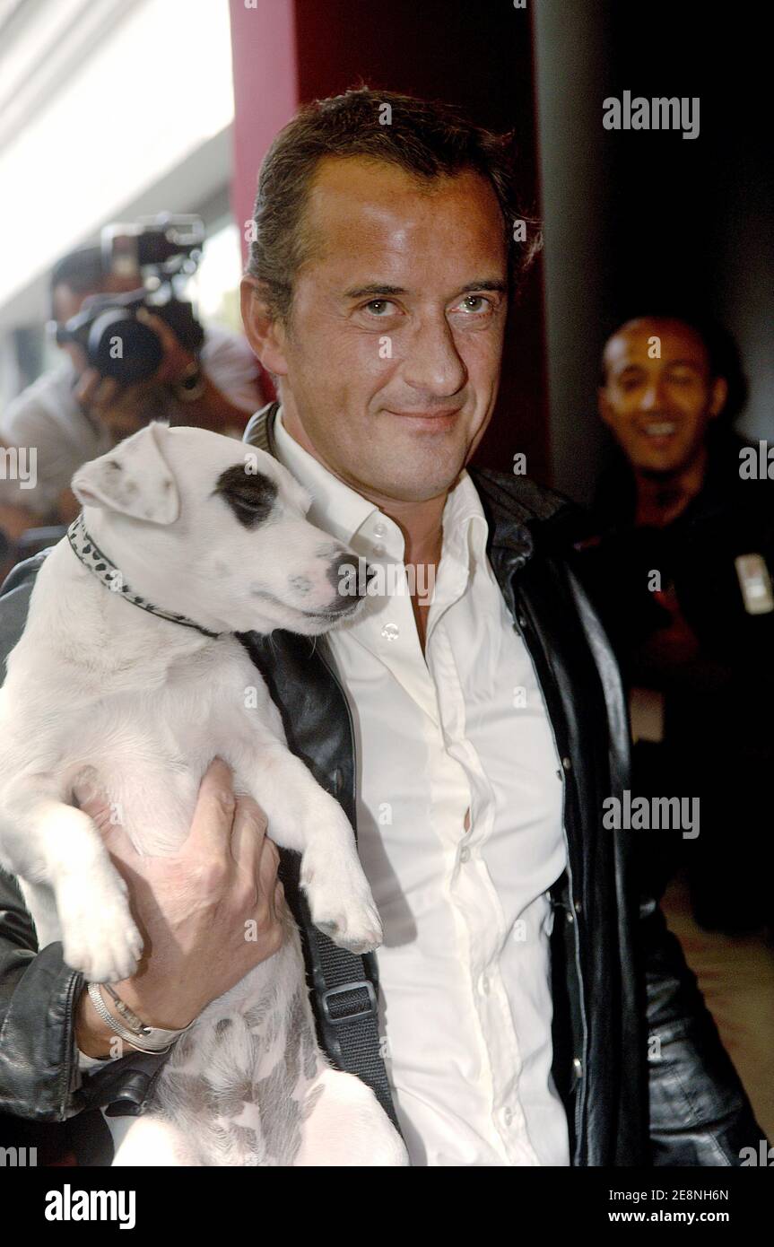 Tv show presenter Christophe Dechavanne with his dog Adeck attends the ...