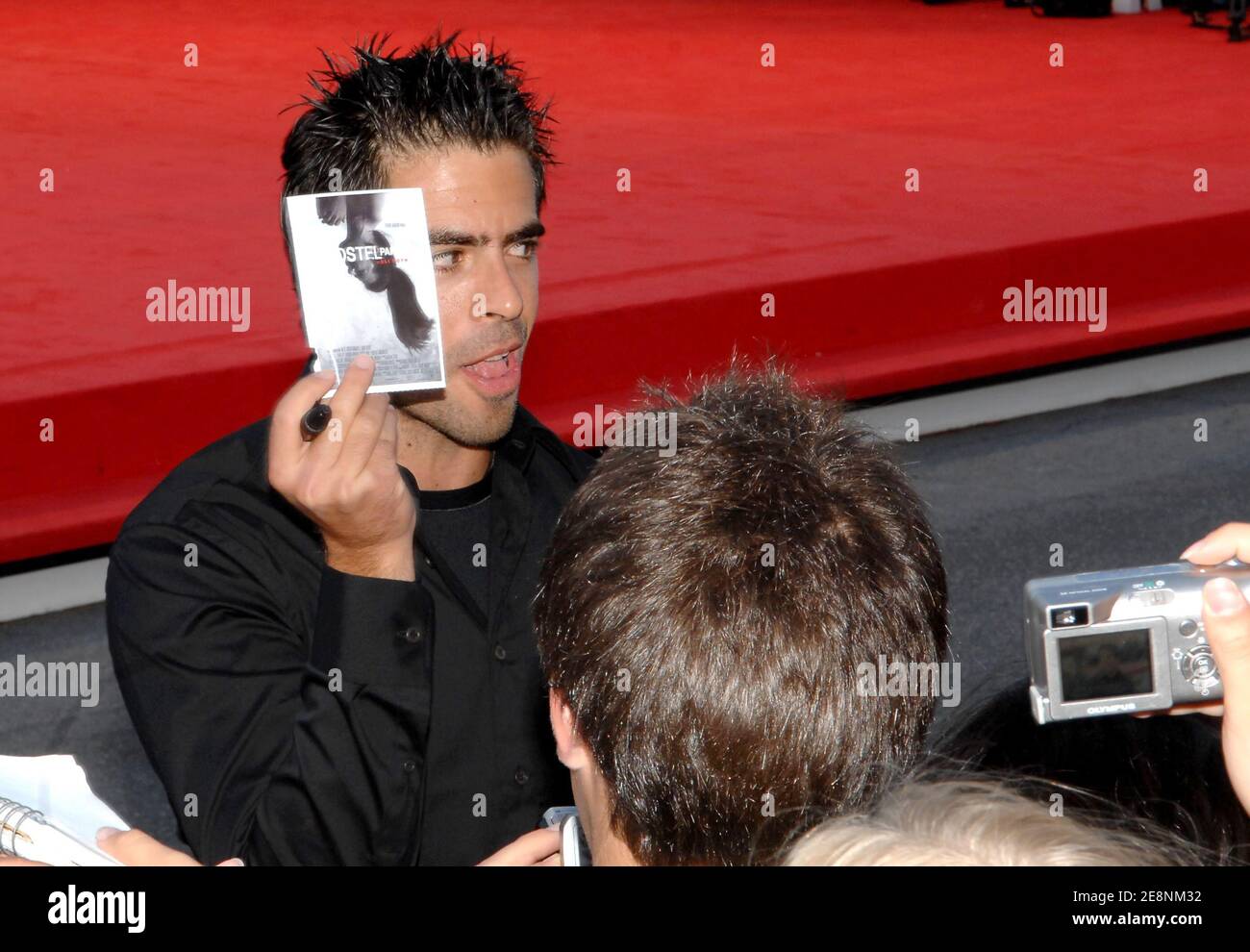 US director Eli Roth poses as he arrives for the premiere of the film ...
