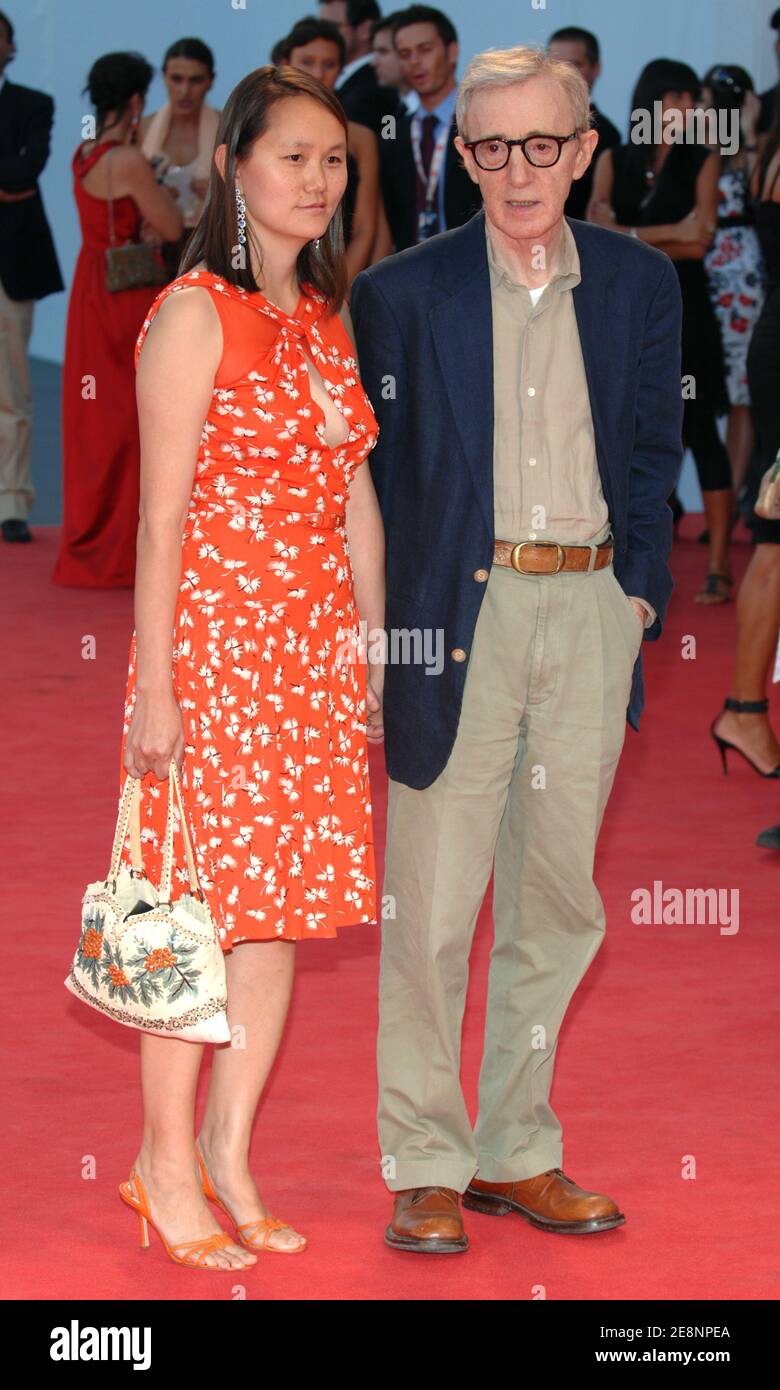 Director Woody Allen and his wife SoonYi Previn walk the red carpet