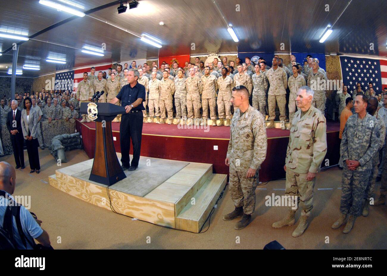 US President George W. Bush delivers his speech to service members during his surprise visit to Al Asad Air Base, Iraq on September 3, 2007. Bush rejected intensifying pressure from the Democratic-led Congress to start pulling troops immediately out of the unpopular war in Iraq. 'Those decisions will be based on a calm assessment by our military commanders on the conditions on the ground, not a nervous reaction by Washington politicians to poll results in the media,' the president said. Photo by DOD via ABACAPRESS.COM Stock Photo
