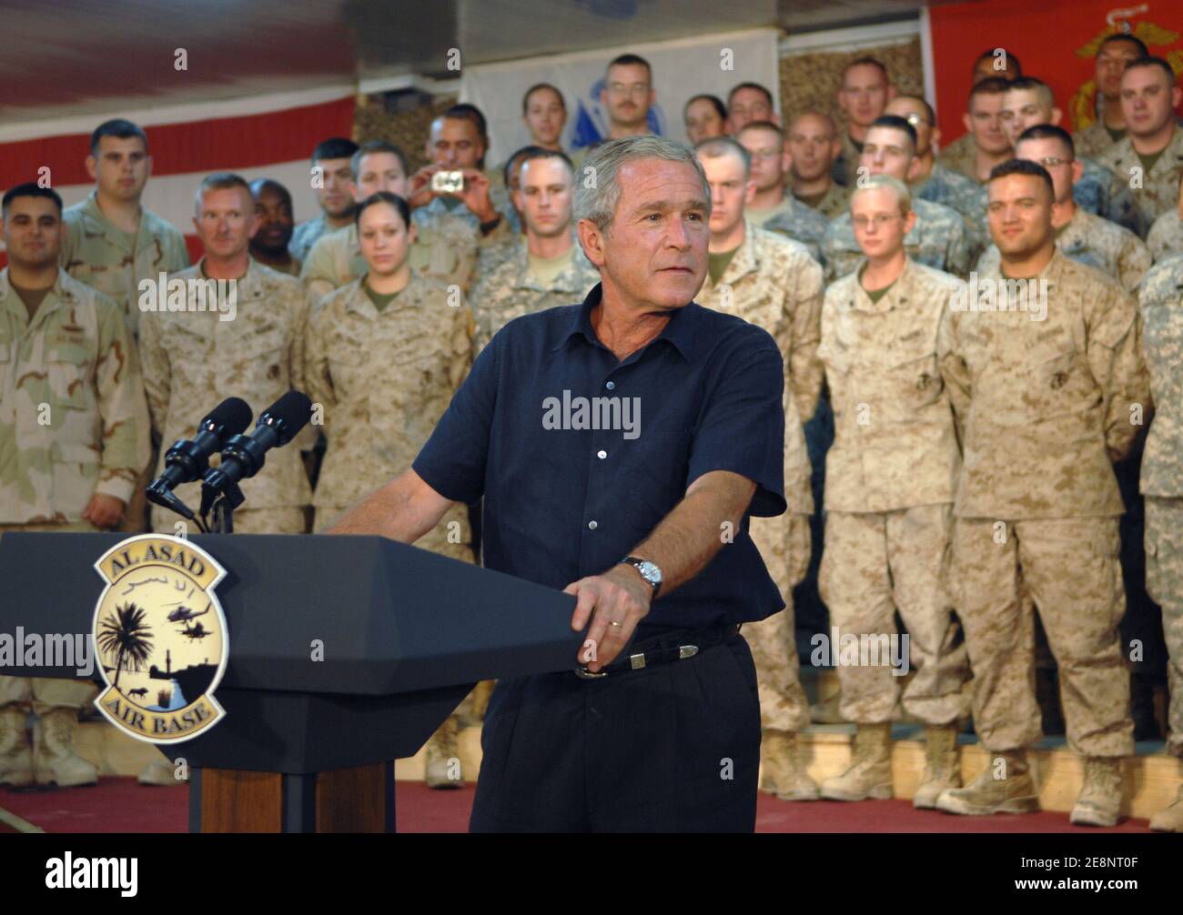 US President George W. Bush delivers his speech to service members during his surprise visit to Al Asad Air Base, Iraq on September 3, 2007. Bush rejected intensifying pressure from the Democratic-led Congress to start pulling troops immediately out of the unpopular war in Iraq. 'Those decisions will be based on a calm assessment by our military commanders on the conditions on the ground, not a nervous reaction by Washington politicians to poll results in the media,' the president said. Photo by DOD via ABACAPRESS.COM Stock Photo