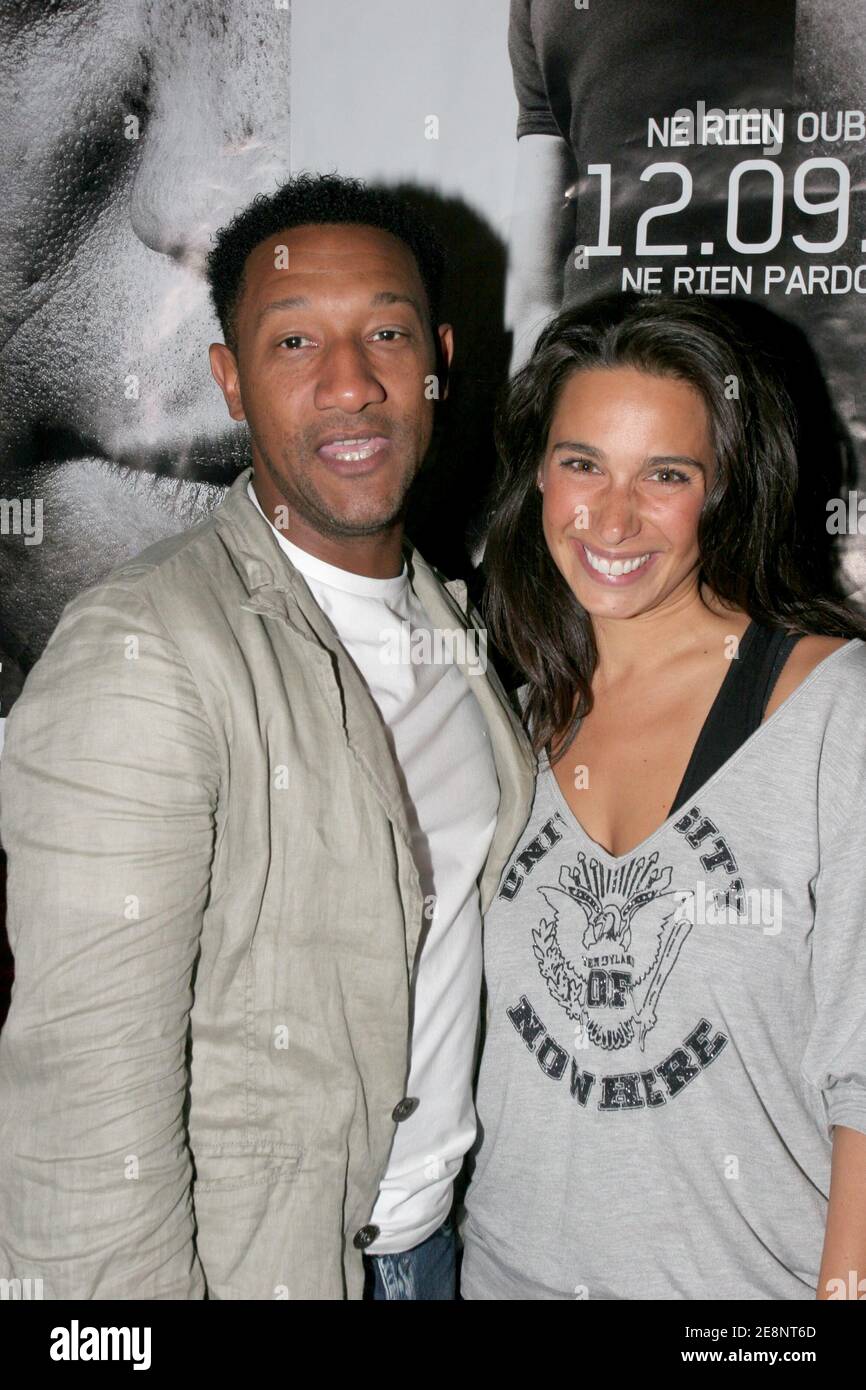 Actor Edouard Montoute and Marie Fugain during the after party of 'The Bourne Ultimatum' at the Planete Hollywood in Paris, France, on September 4, 2007. Photo by Benoit Pinguet/ABACAPRESS.COM Stock Photo