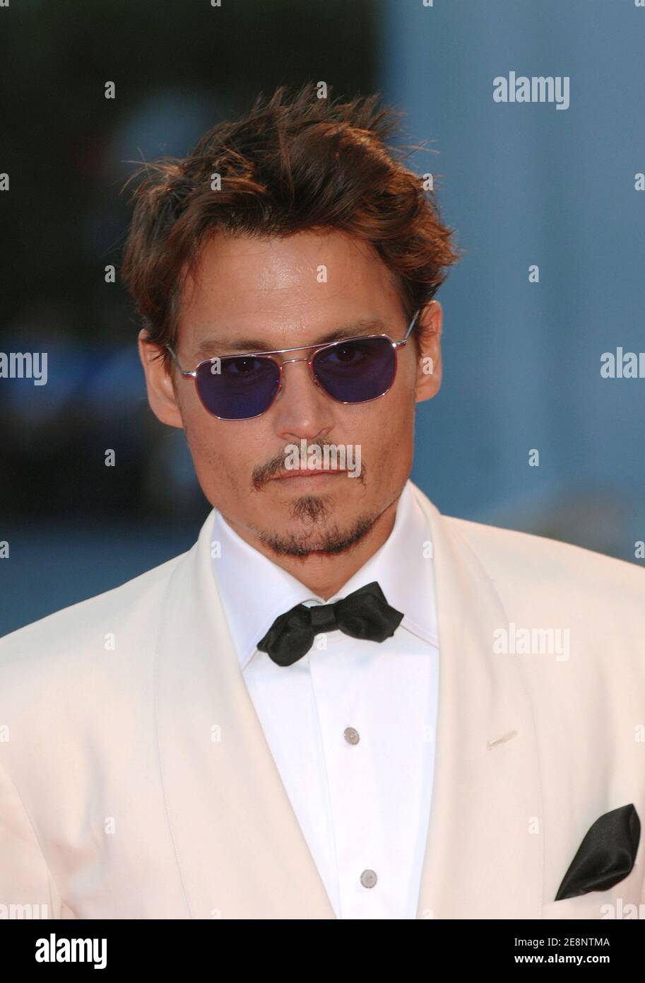 US actor Johnny Depp walks the red carpet prior to the screening of 'The  Nightmare Before Christmas 3-D' and The Tim Burton Golden Lion For Lifetime  Achievement Award ceremony during the 64th