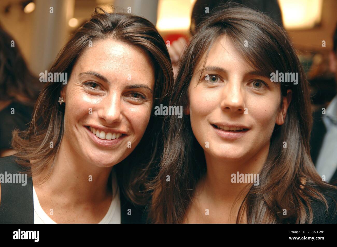 TV presenter Alessandra Sublet and Estelle Denis pose for pictures during the opening party of new 'Nike' women store in Paris, France, on September 5, 2007. Photo by Christophe Guibbaud/ABACAPRESS.COM Stock Photo