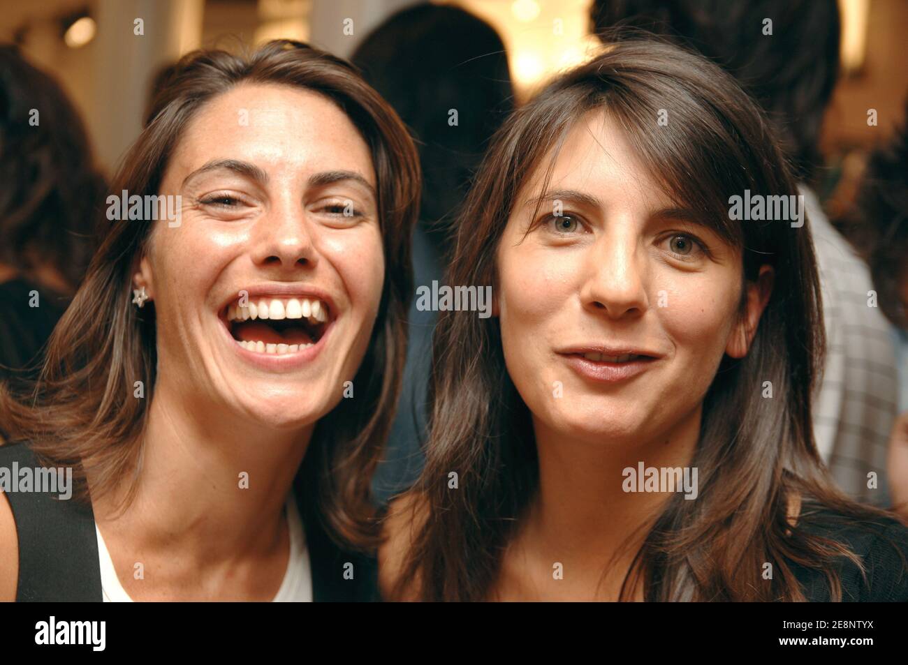 TV presenters Alessandra Sublet and Estelle Denis pose for pictures during the opening party of new 'Nike' women store in Paris, France, on September 5, 2007. Photo by Christophe Guibbaud/ABACAPRESS.COM Stock Photo