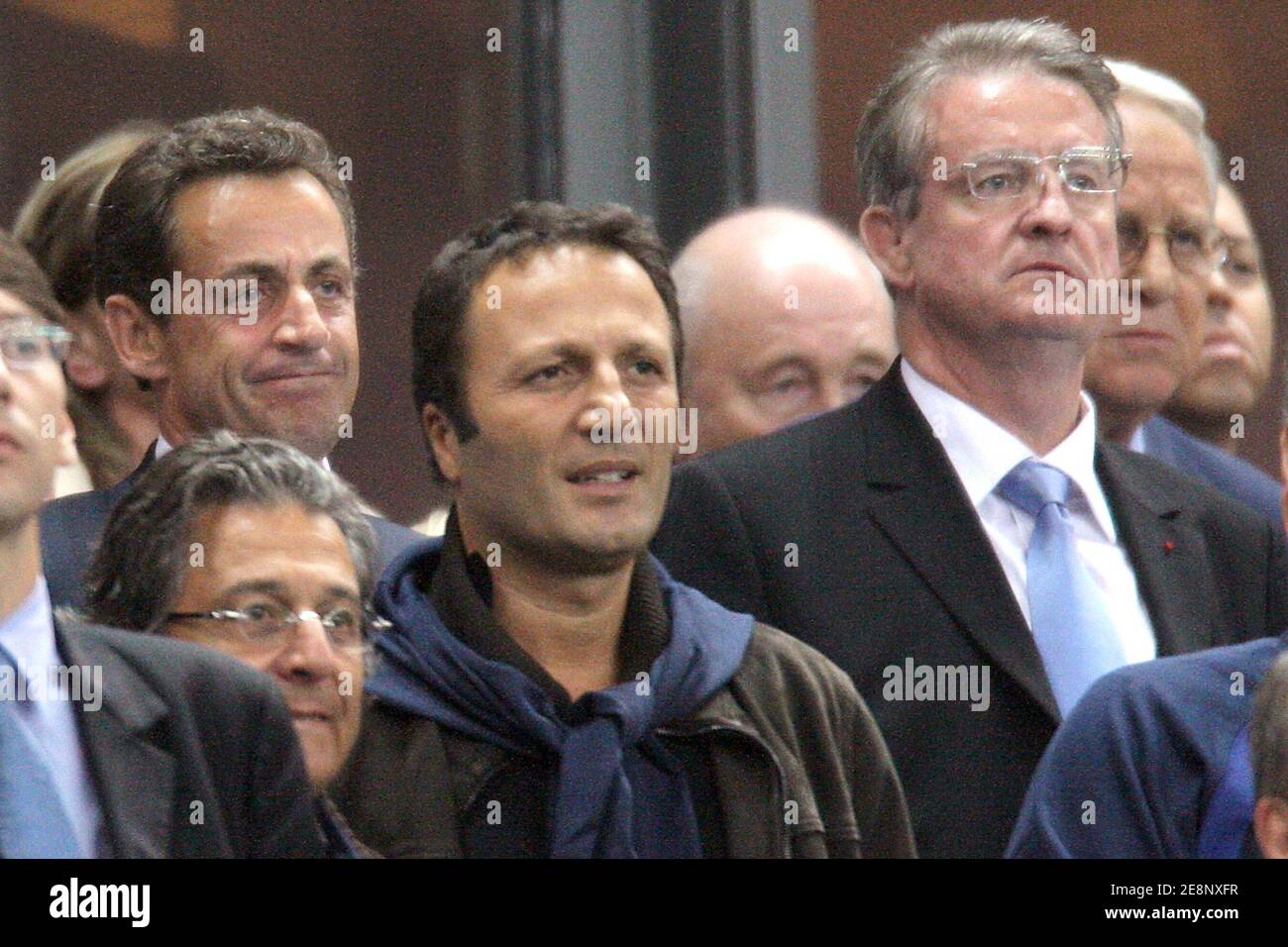 President Nicolas Sarkozy, Christian Clavier, Arthur and FFR president  Bernard Lapasset attend the rugby union World Cup opening match France vs  Argentina at the stade de France in Saint-Denis outside Paris, France