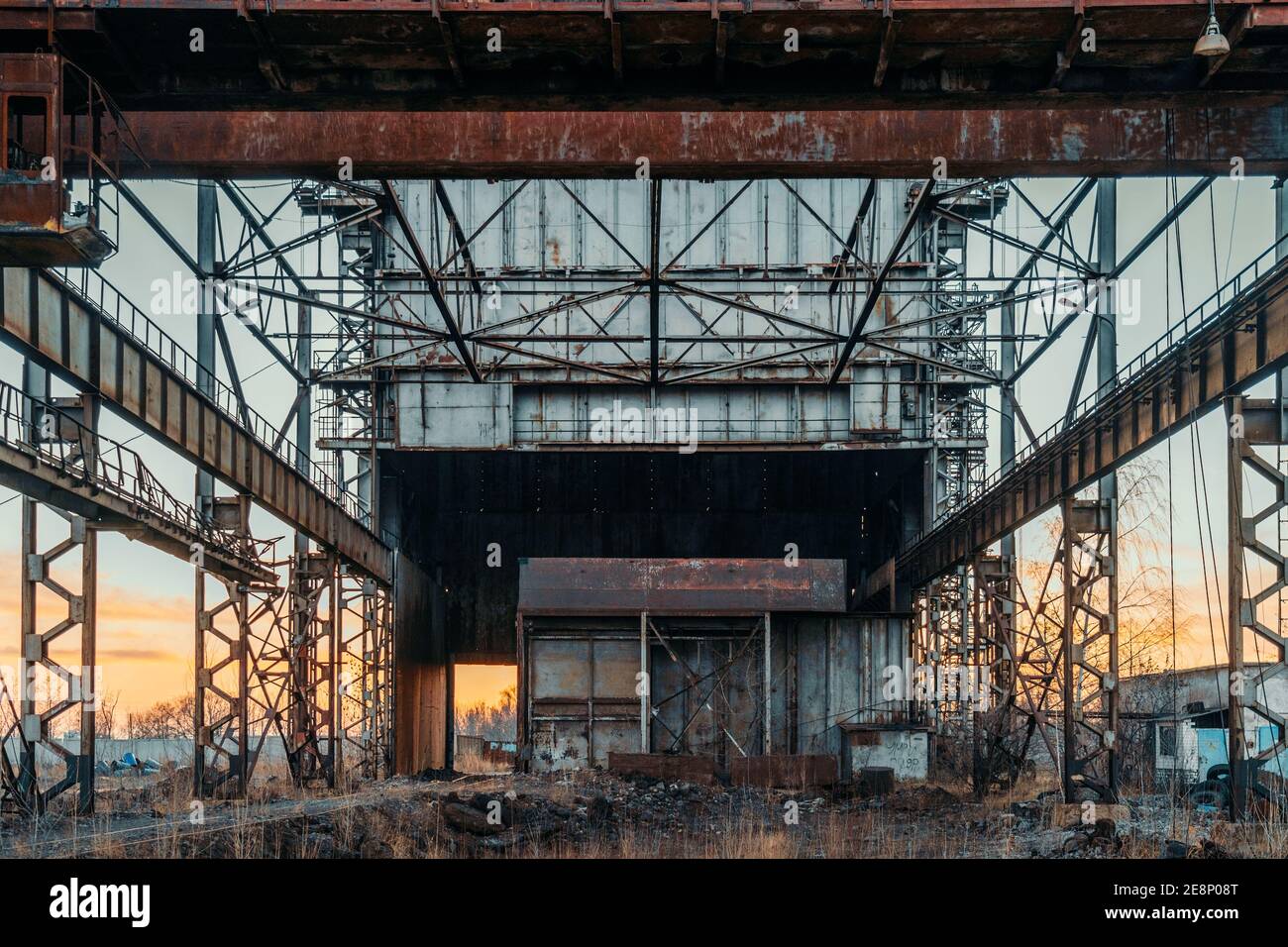 Old abandoned industrial building of metallurgy industry forgotten and waiting for demolition. Stock Photo