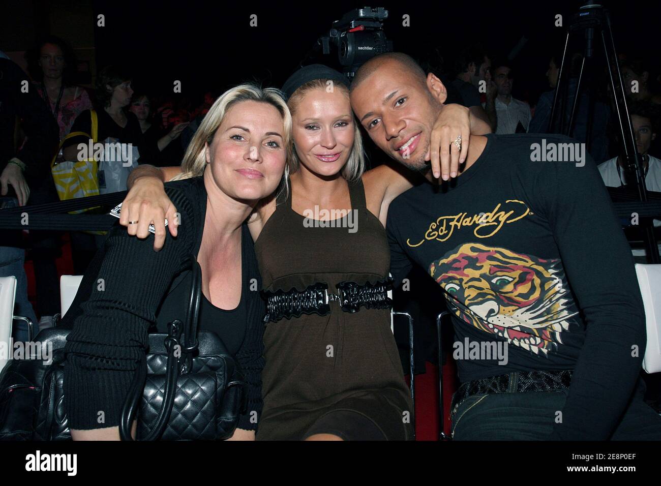 EXCLUSIVE - Sophie Favier withTatiana and Xavier from the TF1 TV show 'Secret Story' during the catwalk at 'who's next' exhibition in Paris, France, on September 9, 2007. Photo by Benoit Pinguet/ABACAPRESS.COM Stock Photo