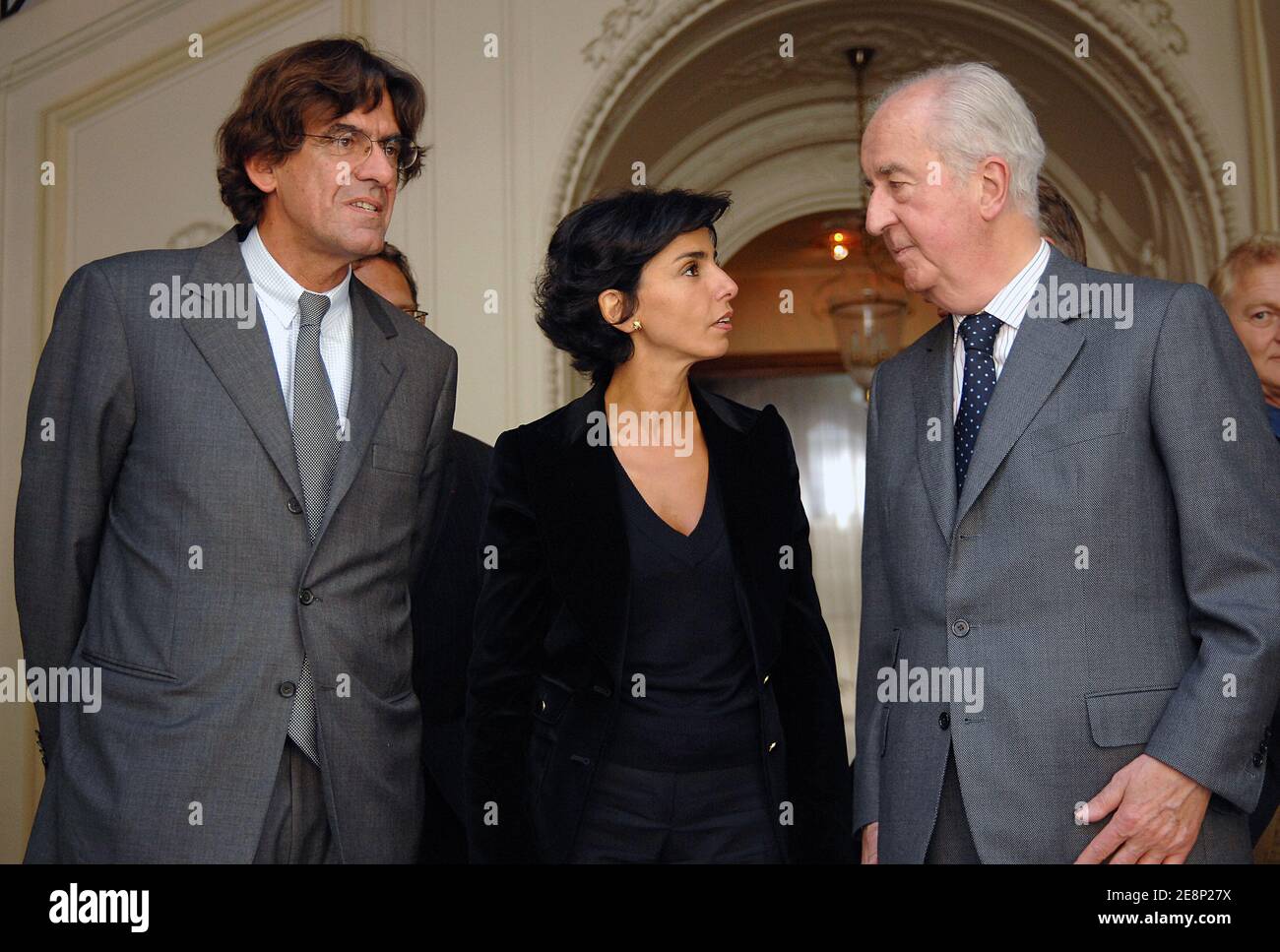 French justice minister Rachida Dati greets former Prime Minister Edouard Balladur (R) and former Education minister Luc Ferry (L) at the end of a lunch with the Committee of reflexion on the modernization and the rebalancing of the institutions, chaired by former Prime Minister Edouard Balladur, in Paris, France, on september 12, 2007. Photo by Christophe Guibbaud/ABACAPRESS.COM Stock Photo