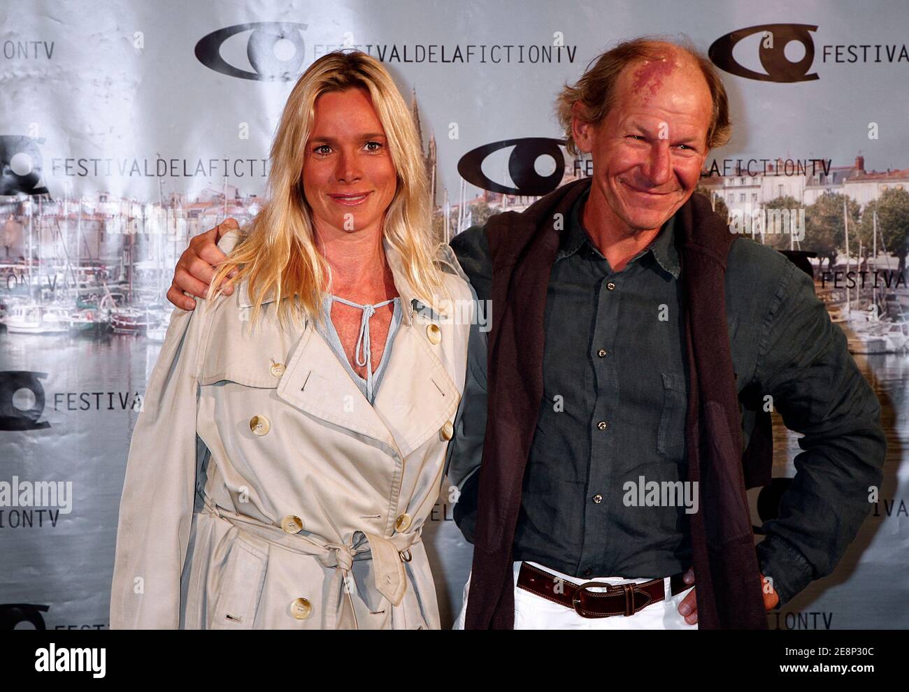 French actress Geraldine Danon and French navigator Philippe Poupon pose at  a photocall during the 9th