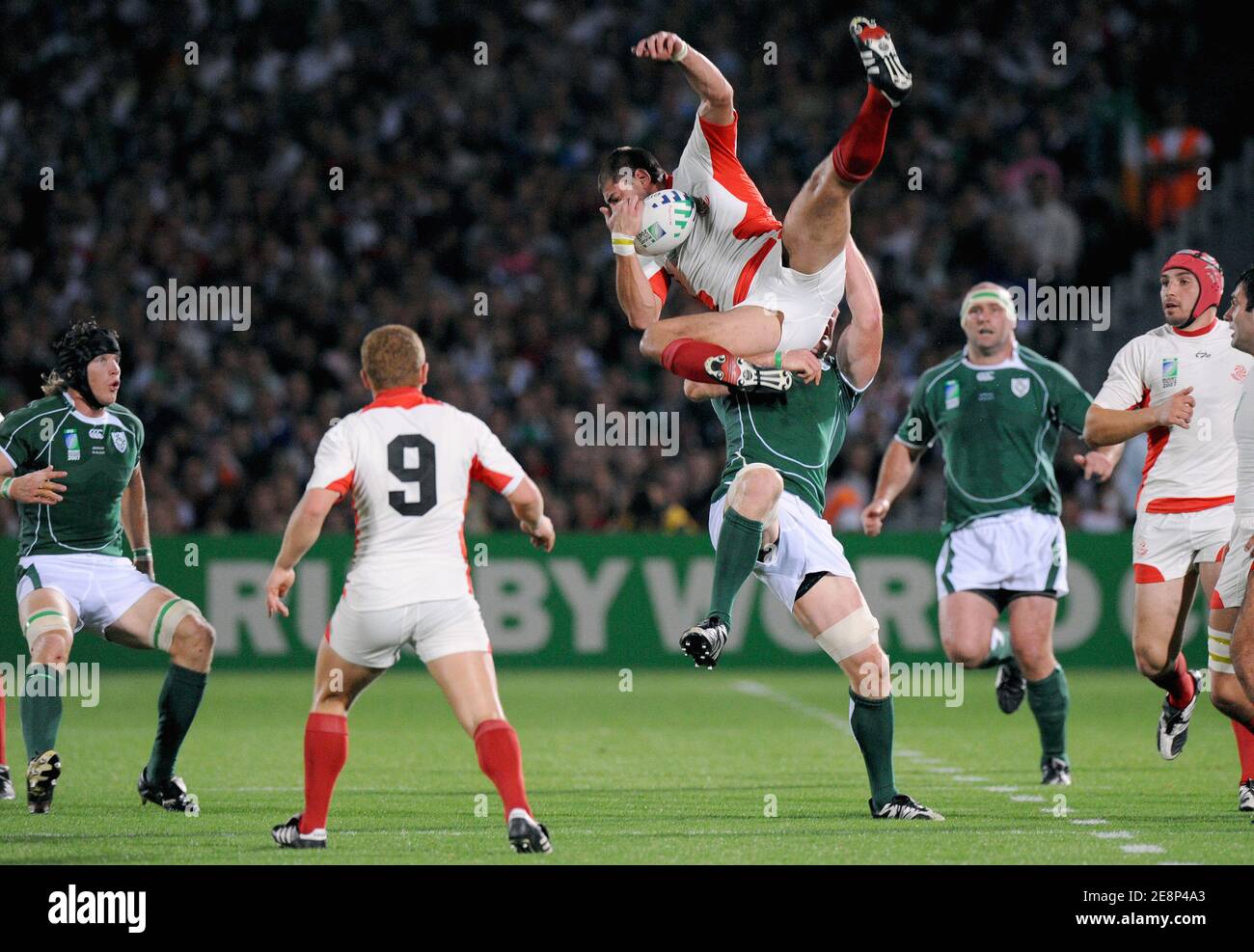 Georgia's Giorgi Chkhaidze falls under the challenge of Ireland's Paul O'Connell during the IRB Rugby World Cup 2007, Pool D, Ireland vs Georgia at the Chaban Delmas Stadium in Bordeaux, France on September 15, 2007. Photo by Nicolas Gouhier/Cameleon/ABACAPRESS.COM Stock Photo