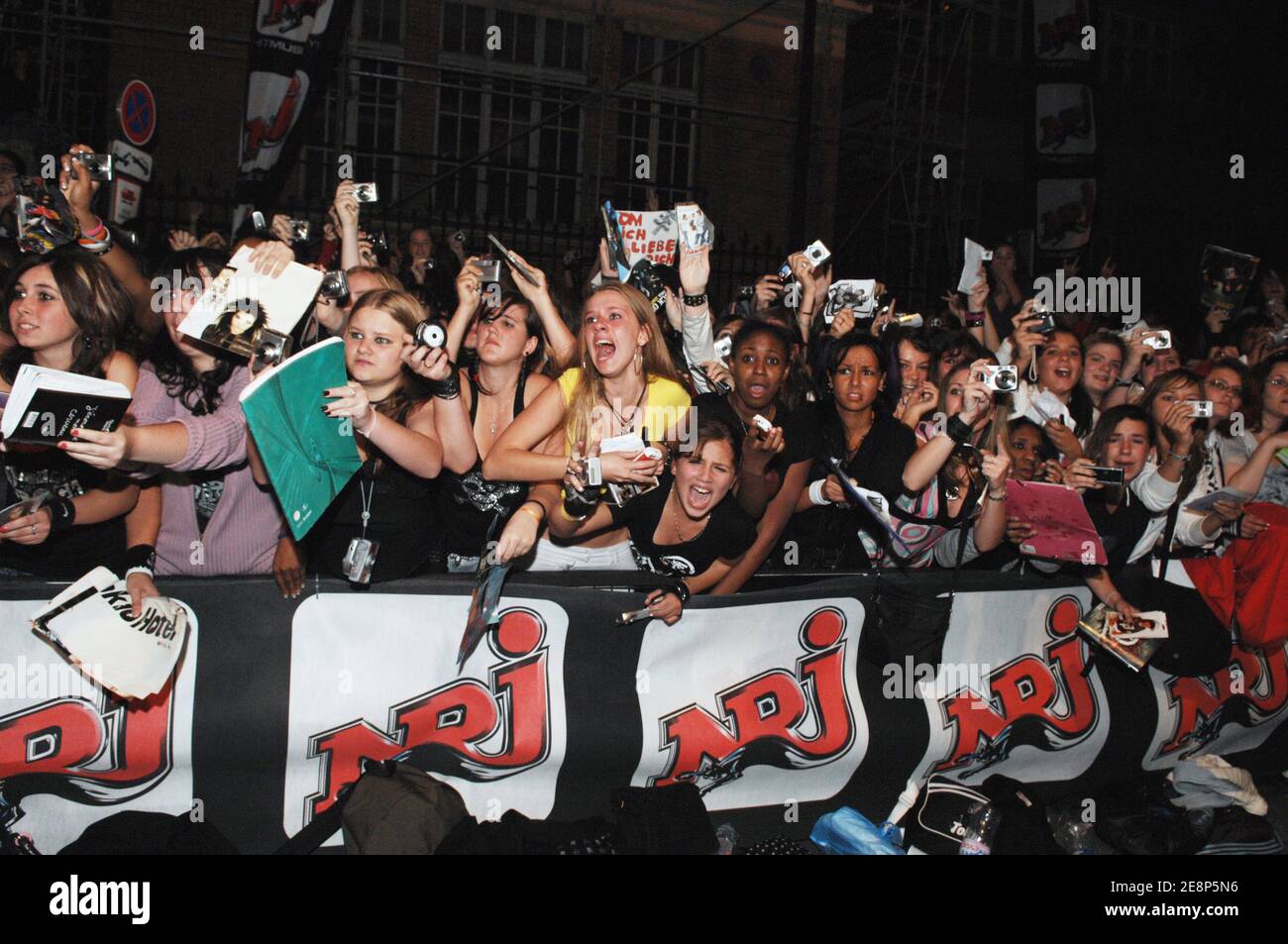 Hysterical French fans of German rock band 'Tokio Hotel' are gathered  outside of NRJ radio station's headquarters in Paris, France, on September  14, 2007. The fans are waiting for the band to