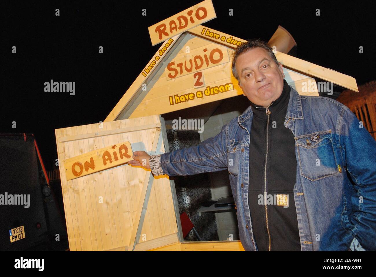 Jules-Edouard Moustic poses next to his radio studio during 3rd Groland's  Film Festival held in Quend, north of France on September 22-23, 2007.  Photo by Ammar Abd Rabbo/ABACAPRESS.COM Stock Photo - Alamy