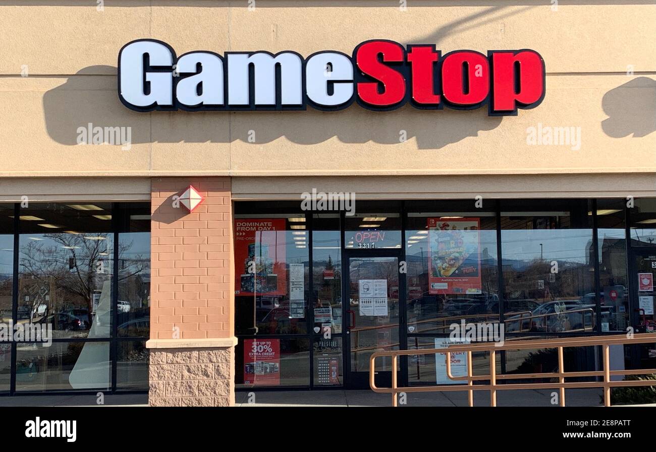 Helena, Montana - January 31, 2021: Gamestop logo sign of storefront, in the news stock rise from reddit investments, Wall Street shares soar, busines Stock Photo