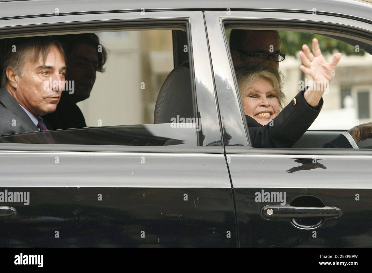Movie legend turned animals rights activist Brigitte Bardot leaves the  Elysee Palace in Paris, France on September 27, 2006, along with head of  Birds Protection League Allain Bougrain-Dubourg, after a meeting on