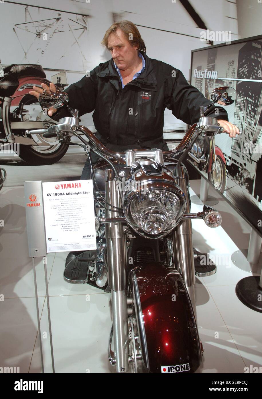 French actor Gerard Depardieu tries out a Yamaha 1900cc during the 'Mondial  du 2 Roues', the bi-annual motorbikes trade show held at the Parc des  Expositions Porte de Versailles in Paris, France,