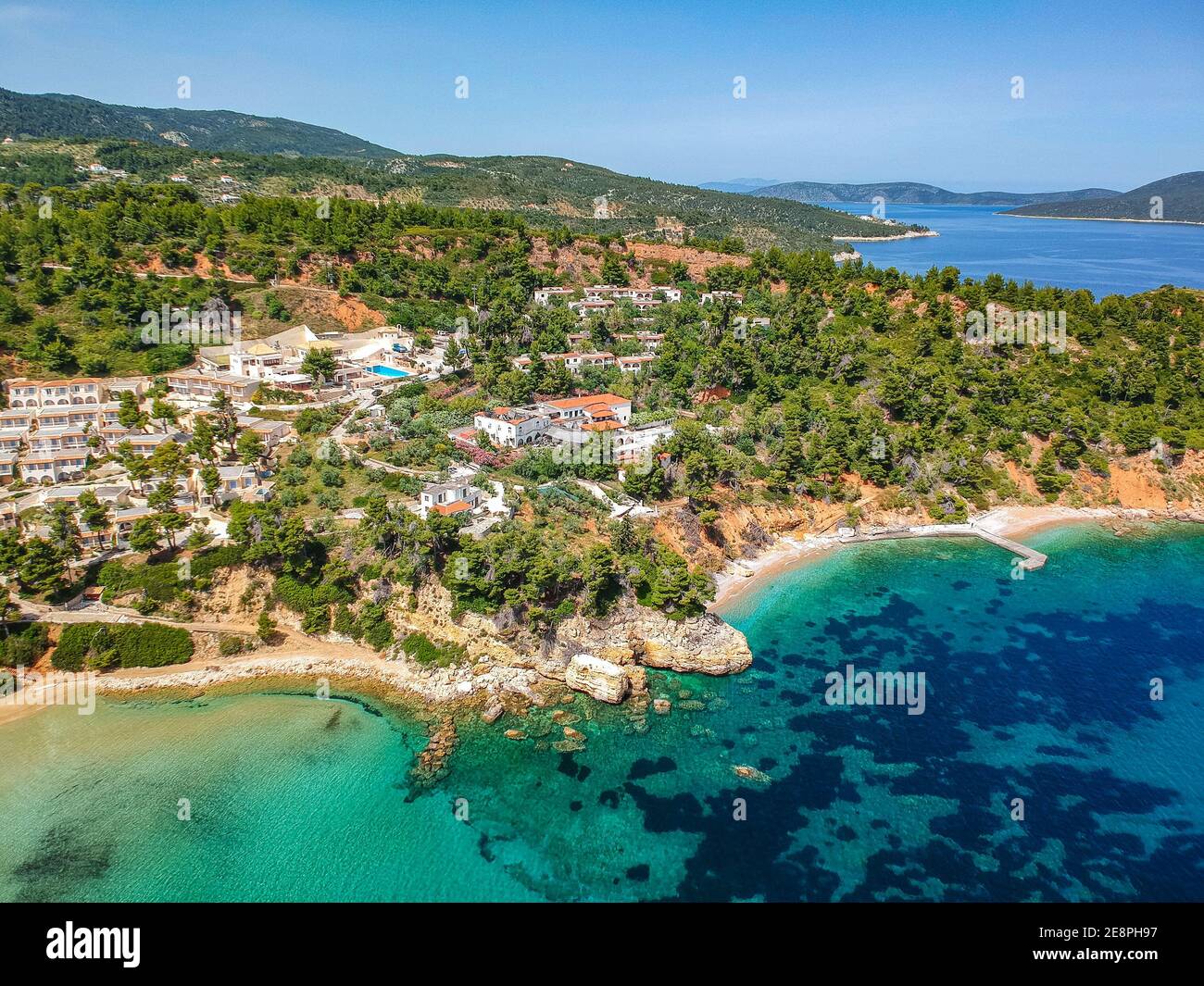 Aerial drone view over Chrisi Milia beach and the rocky surrounded area