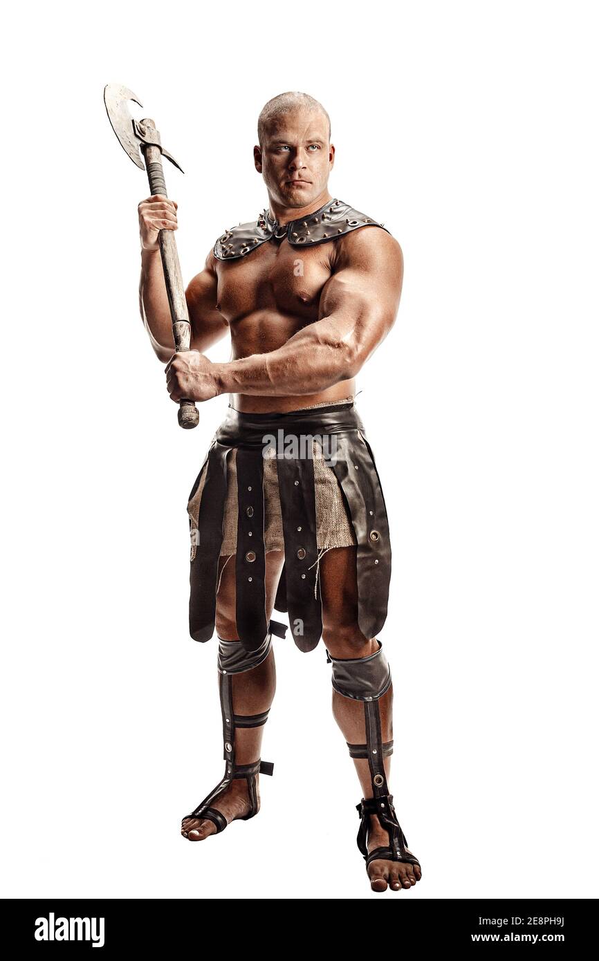 Studio shot of muscular ancient warrior man posing with axe. Isolated on white. Copy space Stock Photo