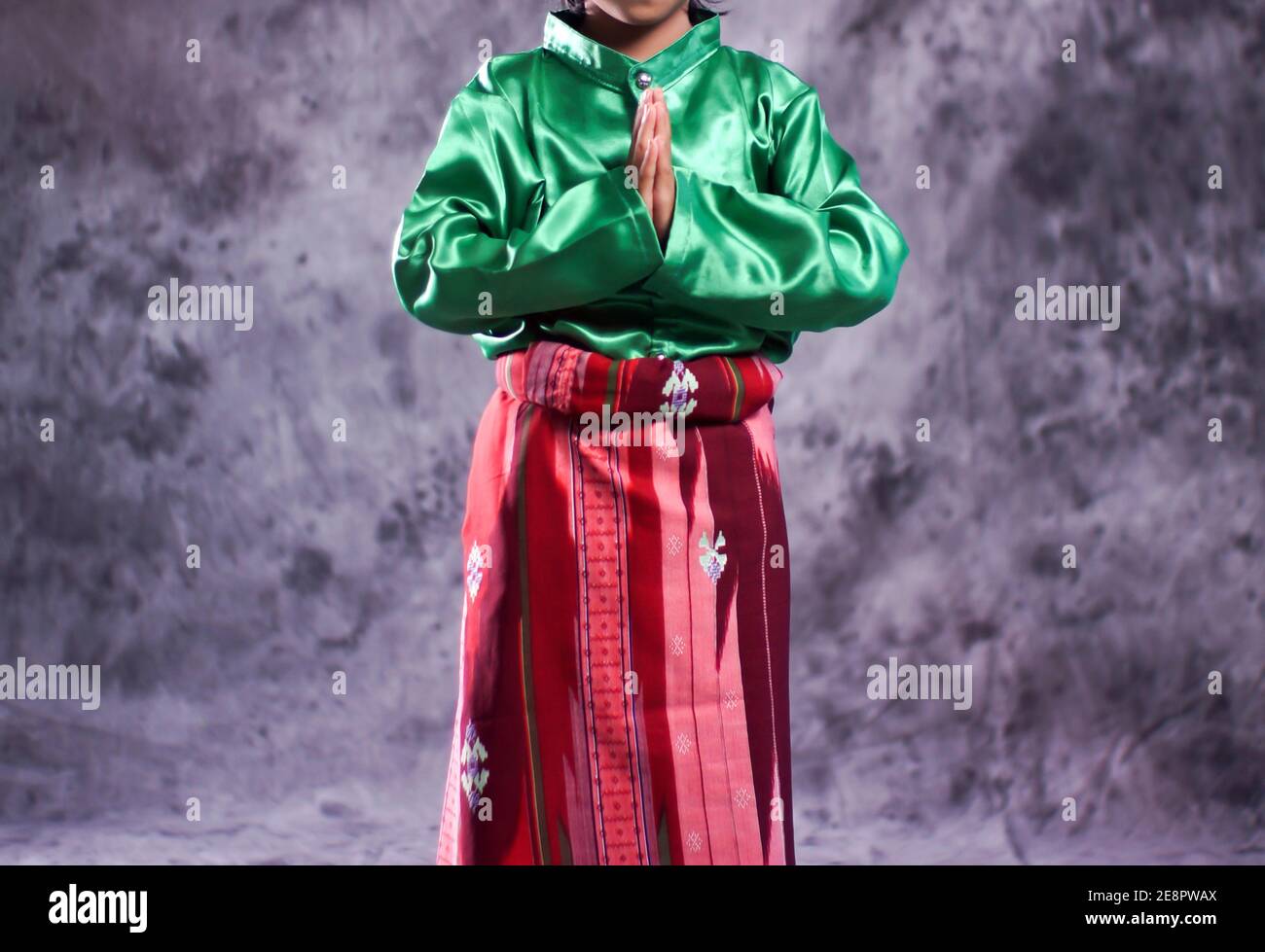 Acehnese traditional clothes with sizes for children are used as clothes for Saman dancers. Indonesian traditional clothes with bright colors. Sumatra Stock Photo