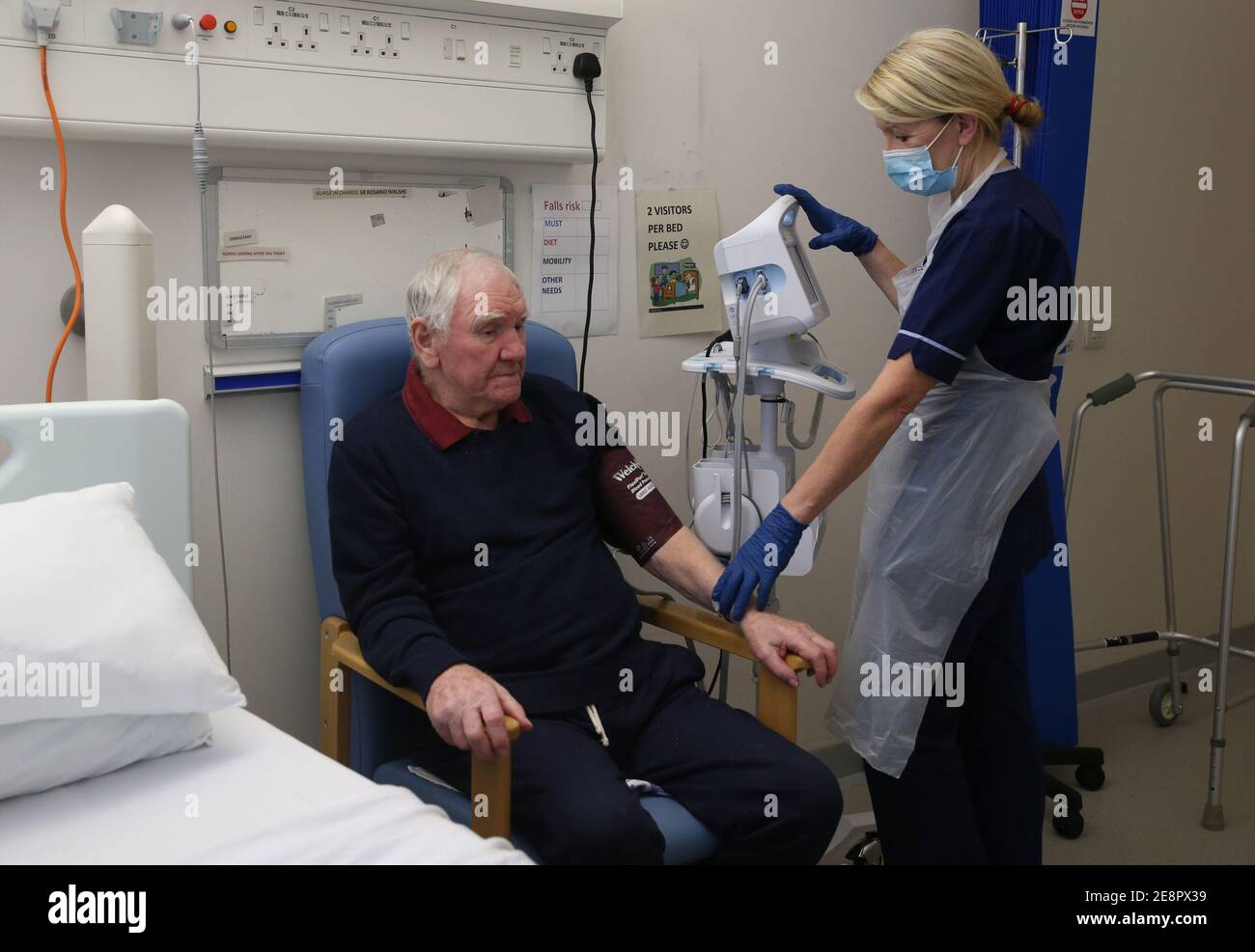 Senior charge nurse Rosario Walshe takes the blood pressure of patient