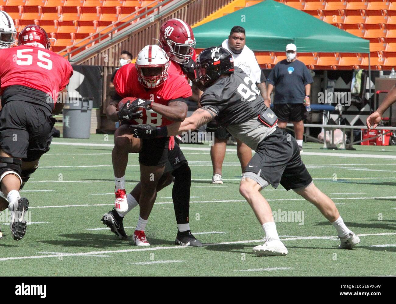 January 28, 2021 - Arkansas State Red Wolves running back Jamal Jones #28 runs by Cincinnati Bearcats defensive tackle Ethan Tucky #92 during a practice session prior to the Hula Bowl at Aloha Stadium in Honolulu, HI - Michael Sullivan/CSM Stock Photo