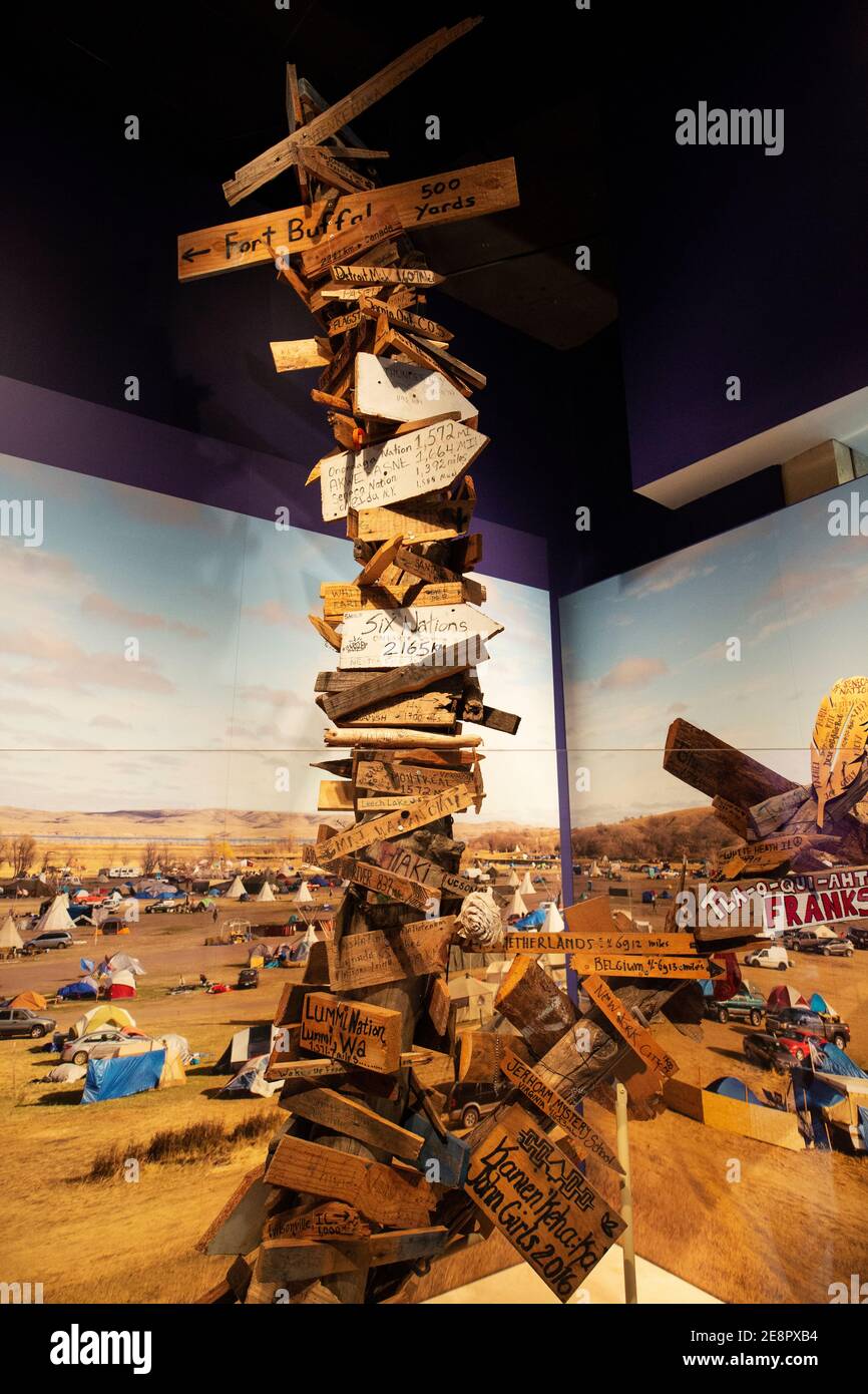 A signpost from the Standing Rock protest against the Dakota Access Pipeline on display at the National Museum of the American Indian in Washington DC. Stock Photo