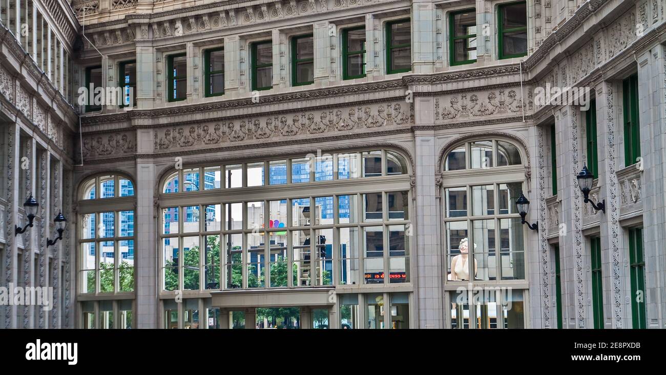 Marilyn Monroe Statue Seen Through The Windows of the Wrigley Building, Chicago, Illinois, USA Stock Photo