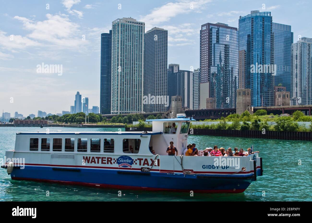 The Water Taxi on the Chicago River With Downtown Skyline, Chicago ...