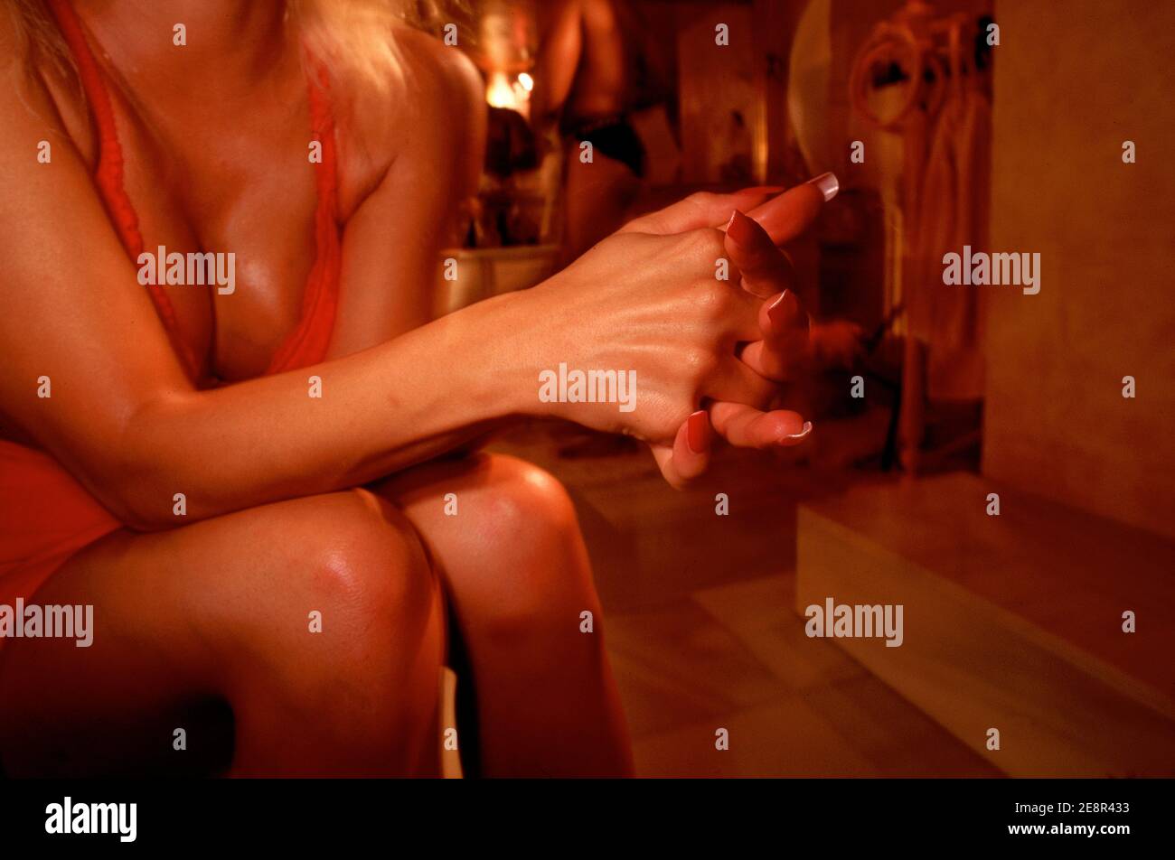 Filming of Pornographic Movie . Porn actress from Hungary waits between  takes at an expensive home in Ibiza, Spain Stock Photo - Alamy