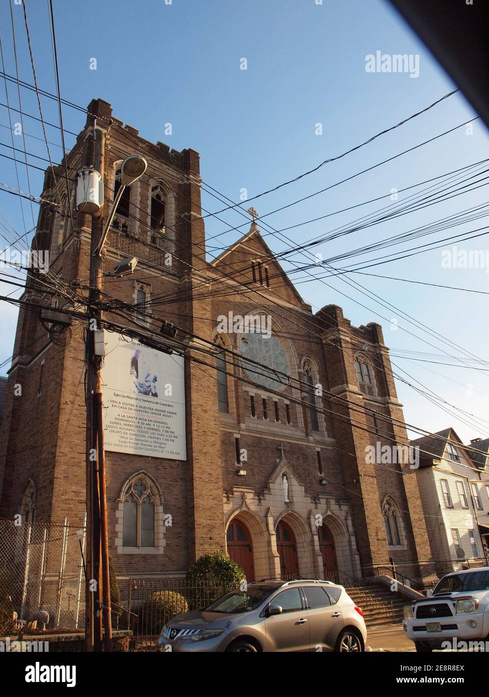 Overhead utility wires crowd out a church in new jersey hires stock