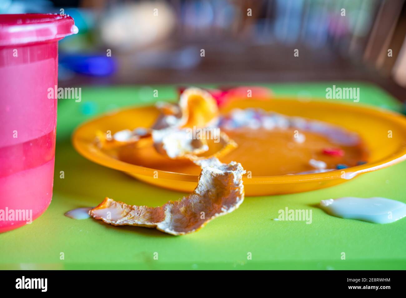 Children can be messy eaters typical arrangement after eating Stock